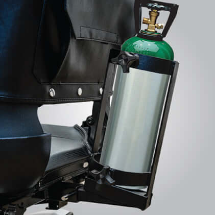 Oxygen tank holder attached to a Pride Mobility scooter, designed for easy transport of portable oxygen.