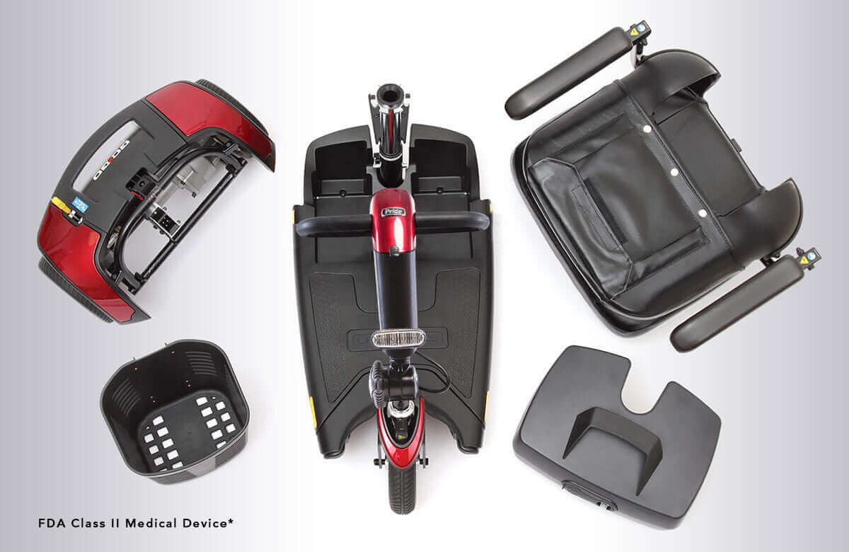 Top view of Go Go® Sport scooter disassembled with parts, showcasing red and black design, FDA Class II Medical Device.