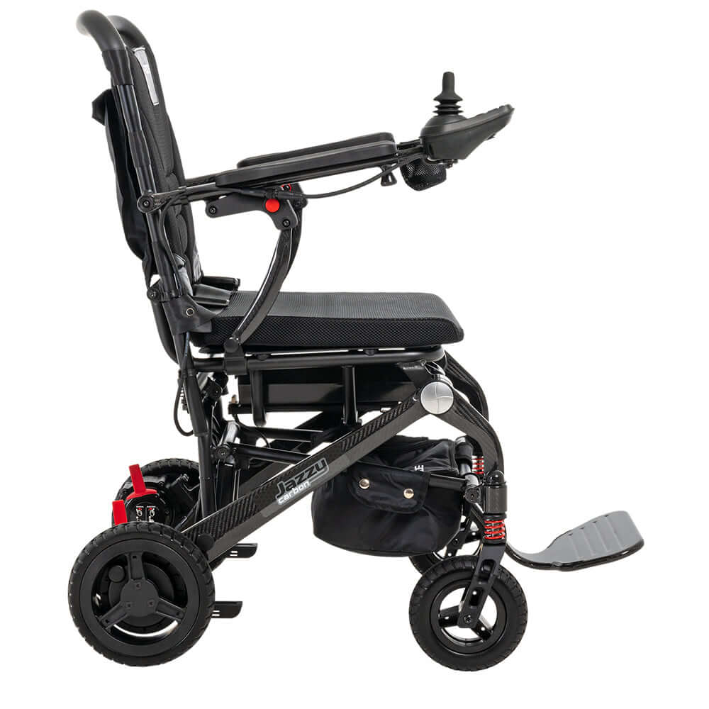 Jazzy® Carbon Power Chair side view showcasing lightweight carbon fiber frame and removable joystick.