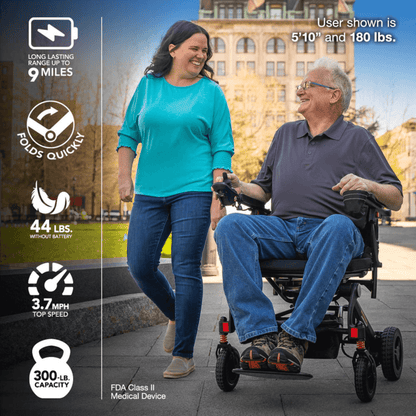 Rider using the Rascal Carbon Cruiser power wheelchair outdoors, 300 lb capacity and 9 mile range