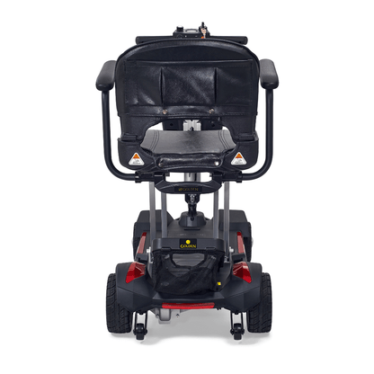 Rear view of the Buzzaround CarryOn folding scooter, showcasing its compact design and comfortable seat for travel.