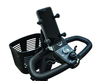 Cell phone holder mounted on a scooter handlebar with a basket, showcasing the RAM® X-Grip® design for hands-free use.