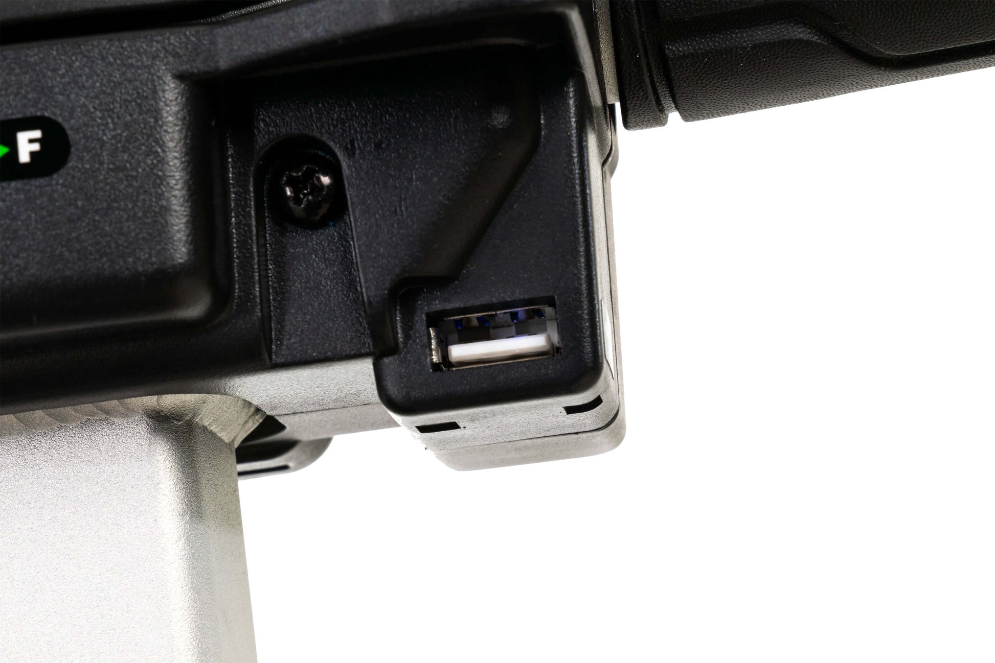 Close-up of USB charging port on the iGo™️ Folding Mobility Scooter for convenient mobile device charging.