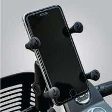RAM X-Grip cell phone holder securely attaching a smartphone to a scooter for hands-free convenience.